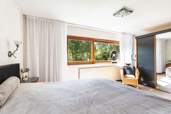 Foto - Te koop: Goed onderhouden tussenwoning in rustige woonwijk!
